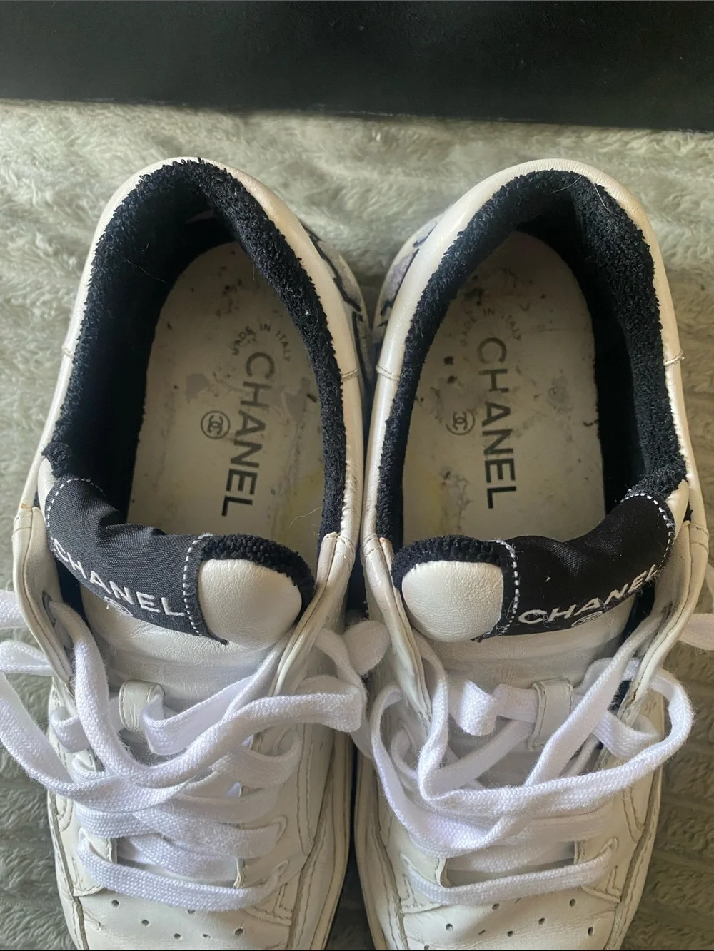 CHANEL White Leather Womens Low-Top Sneakers with Black Accents